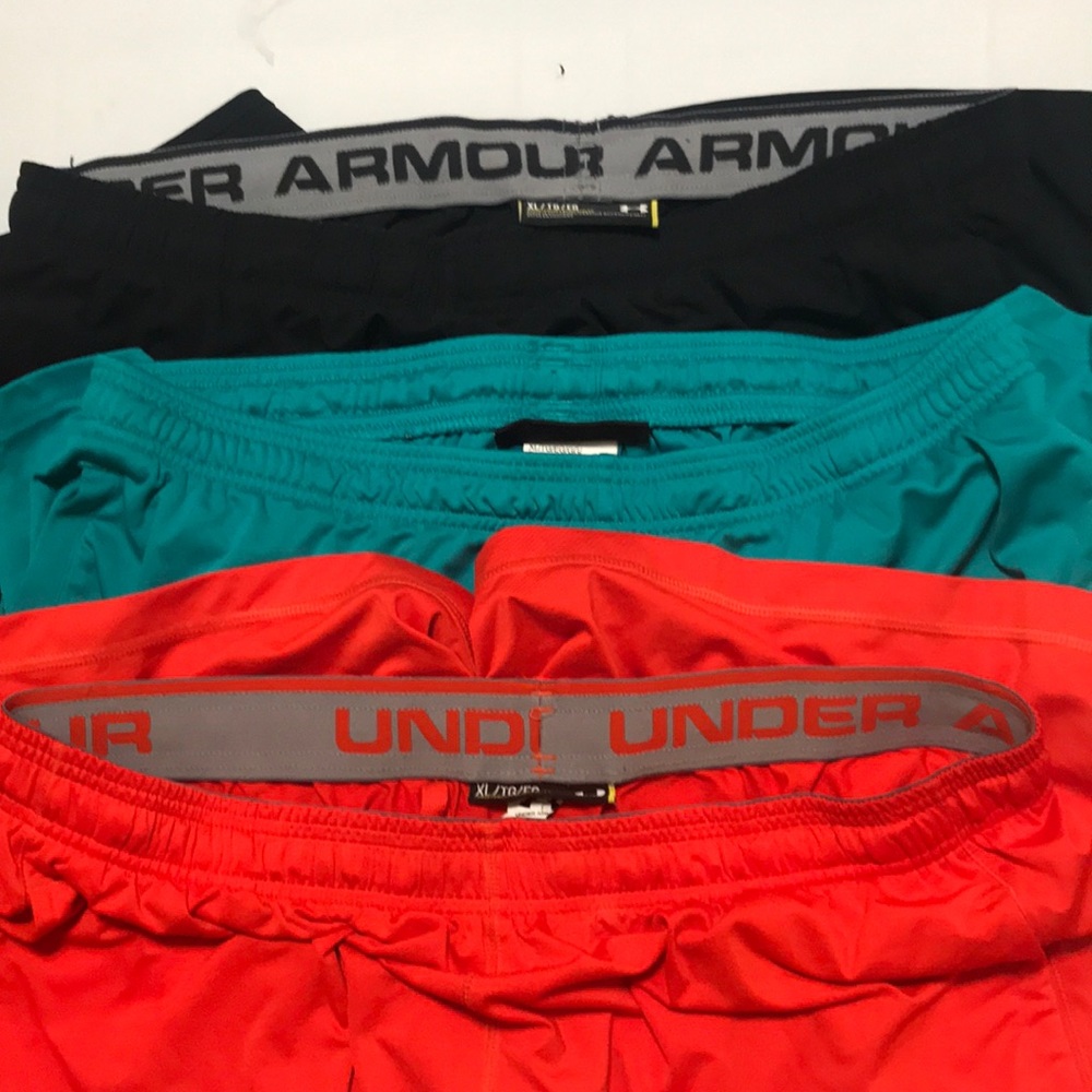 Three pair of under armor shorts